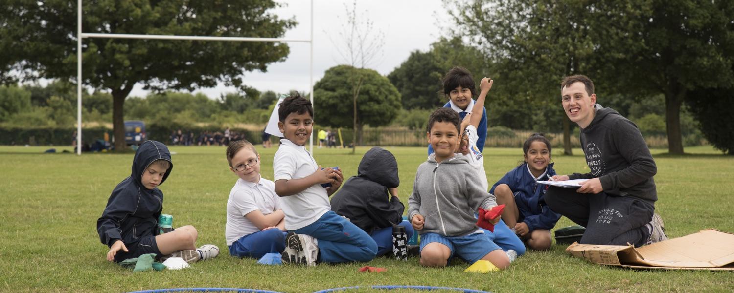 Students on a rugby pitch